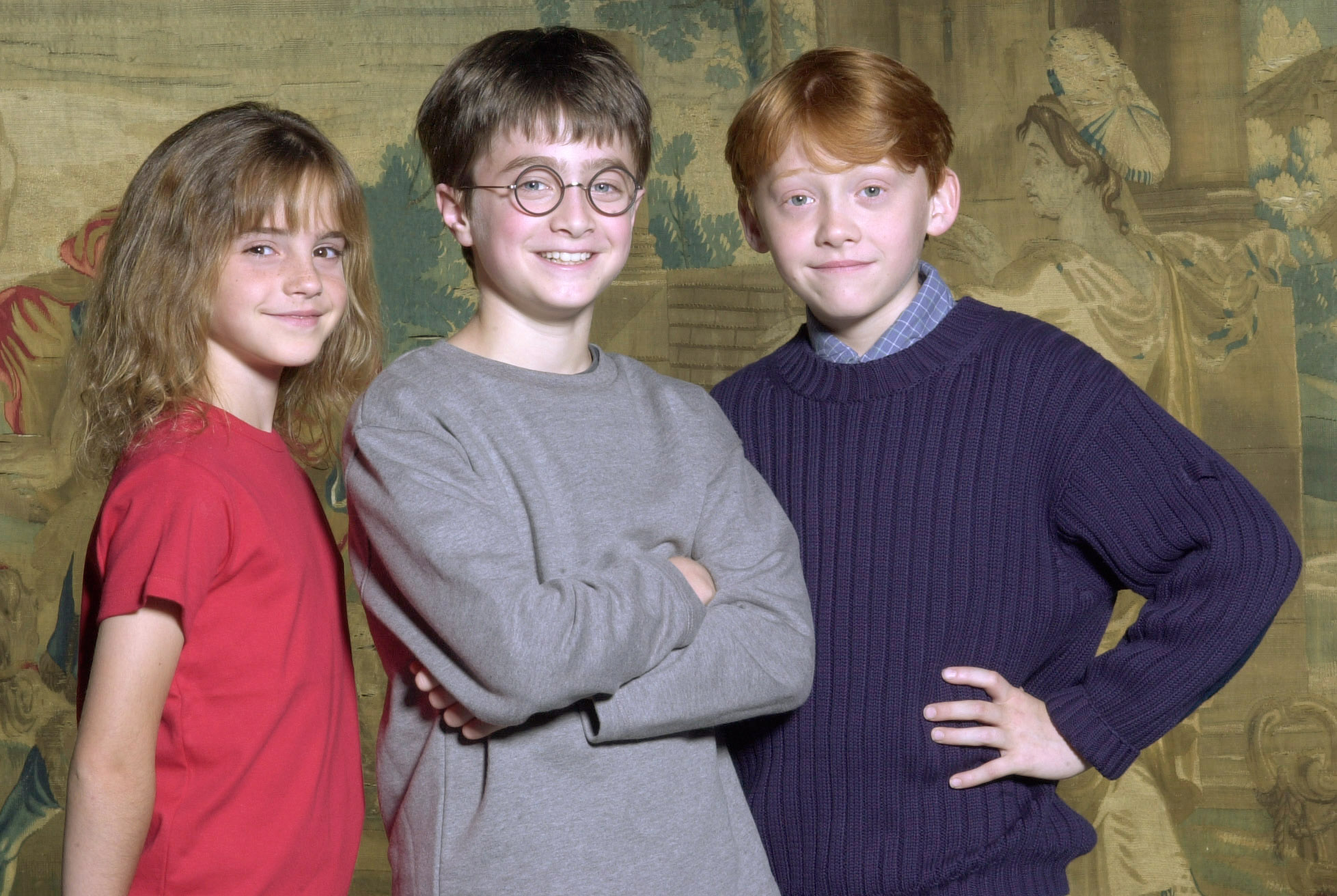 Daniel Radcliffe, Mitte, wurde in einem Beitrag vom 21. August 2000 als der Schauspieler genannt, der Harry Potter in dem kommenden Film neben Rupert Grint, rechts, und Emma Watson spielen wird: Getty Images