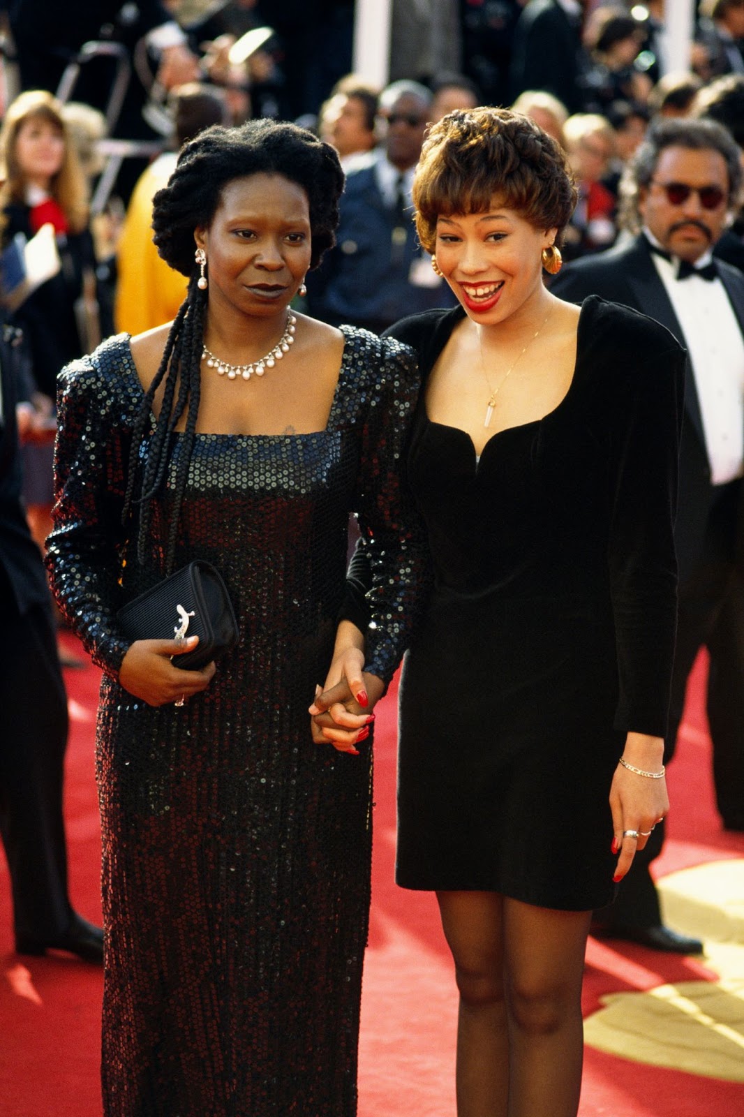 Whoopi Goldberg und Alex Martin bei der 63. Oscarverleihung 1991. | Quelle: Getty Images