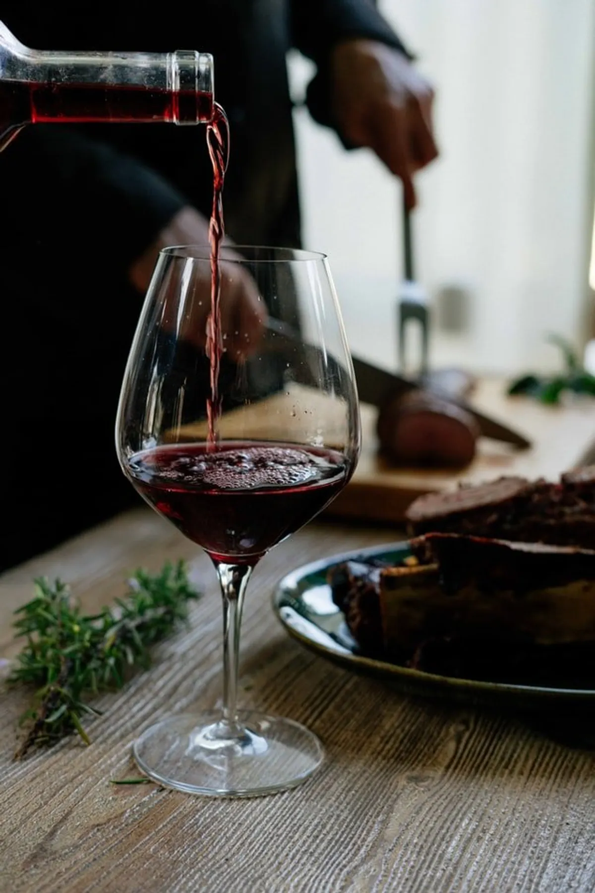 Pour a glass of red wine.  |  Source: Unsplash
