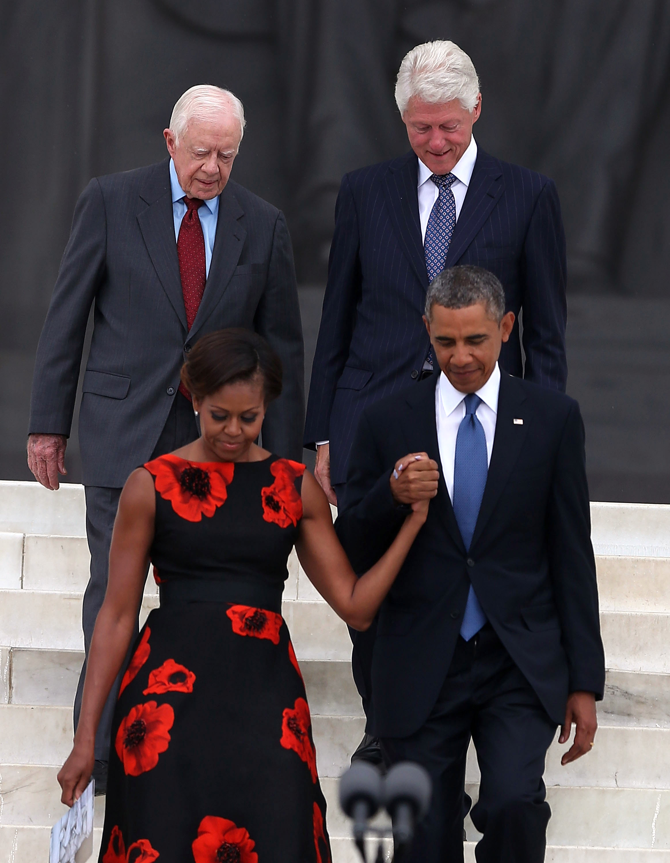 Jimmy Carter und Bill Clinton fotografiert mit Michelle und Barack Obama am 28. August 2013 in Washington, D.C. | Quelle: Getty Images