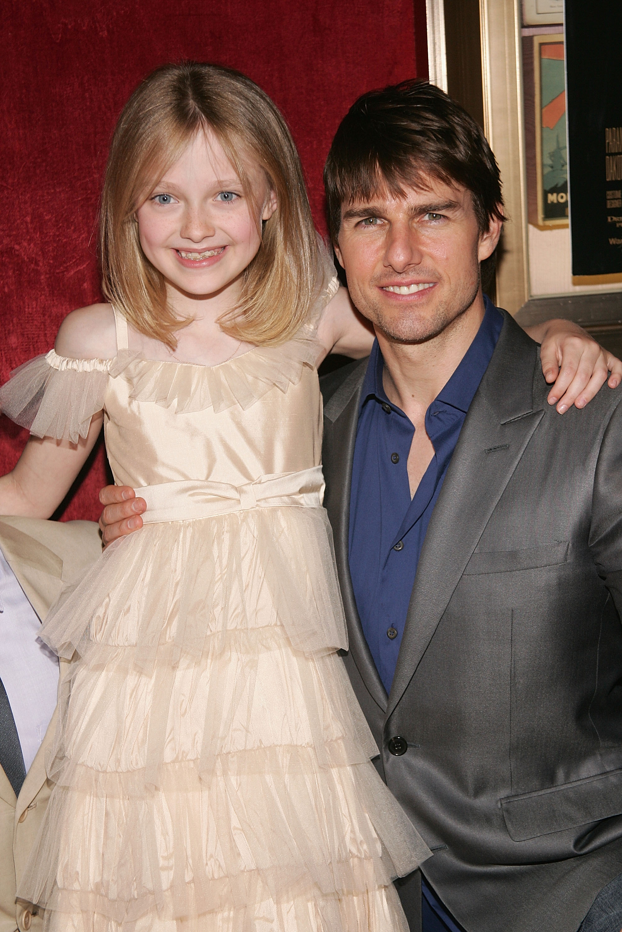 Dakota Fanning und Tom Cruise bei der Premiere von "War of The Worlds" am 23. Juni 2005 in New York City. | Quelle: Getty Images