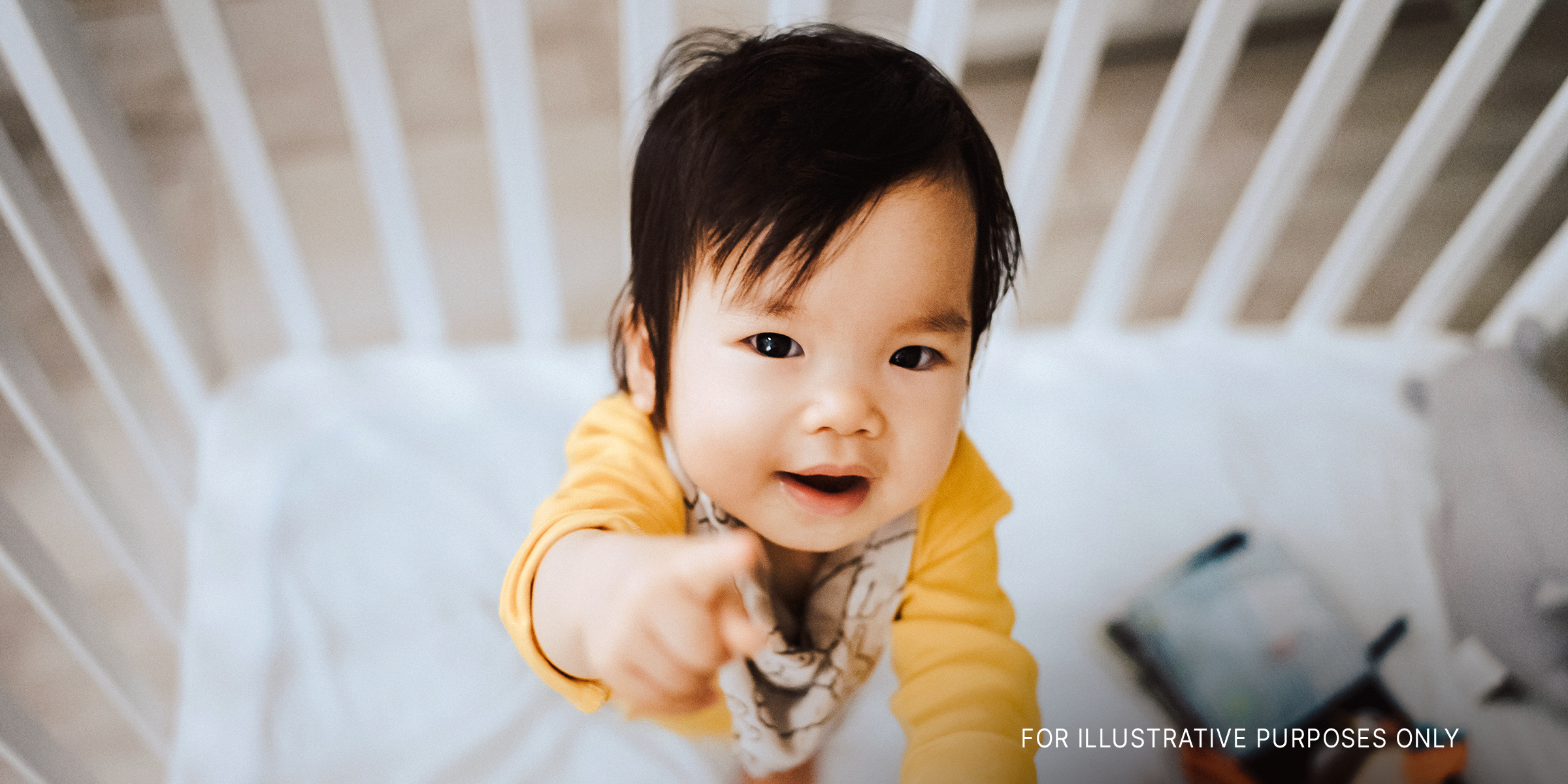 Ein asiatisches Baby schaut in die Kamera | Quelle: Getty Images