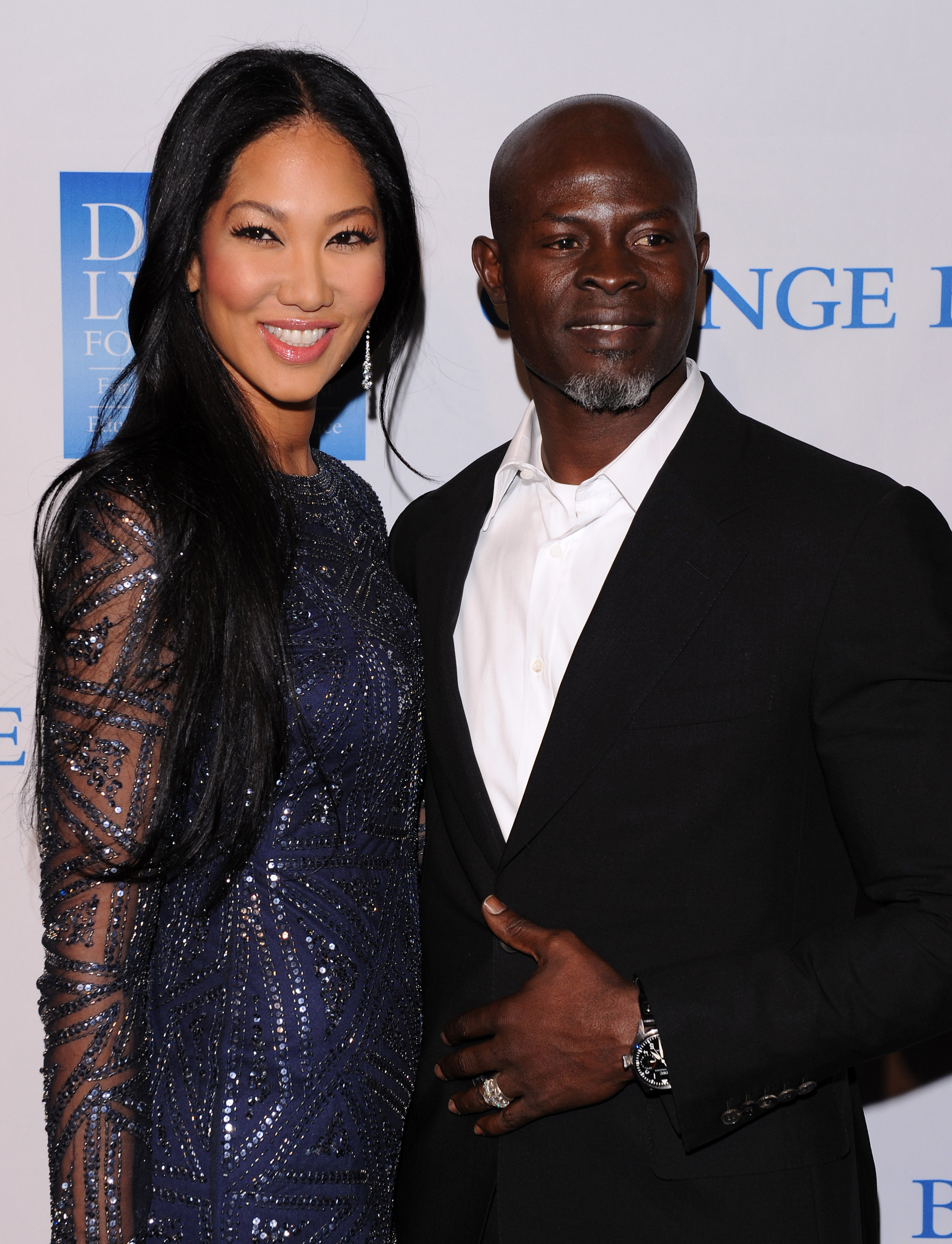 Kimora Lee Simmons und Djimon Hounso bei der 3rd Annual "Change Begins Within" Benefizveranstaltung am 3. Dezember 2011 in Los Angeles, Kalifornien | Quelle: Getty Images