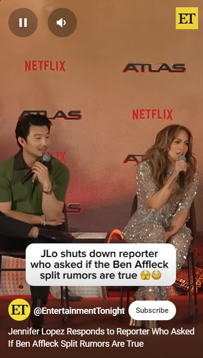 Simu Liu und Jennifer Lopez schauen den Reporter an, der Lopez während einer Pressetour für ihren Film "Atlas" in Mexiko-Stadt nach ihrer angeblichen Scheidung von Ben Affleck fragte, wie in einem am 24. Mai 2024 geteilten Video zu sehen ist. | Quelle: YouTube/EntertainmentTonight