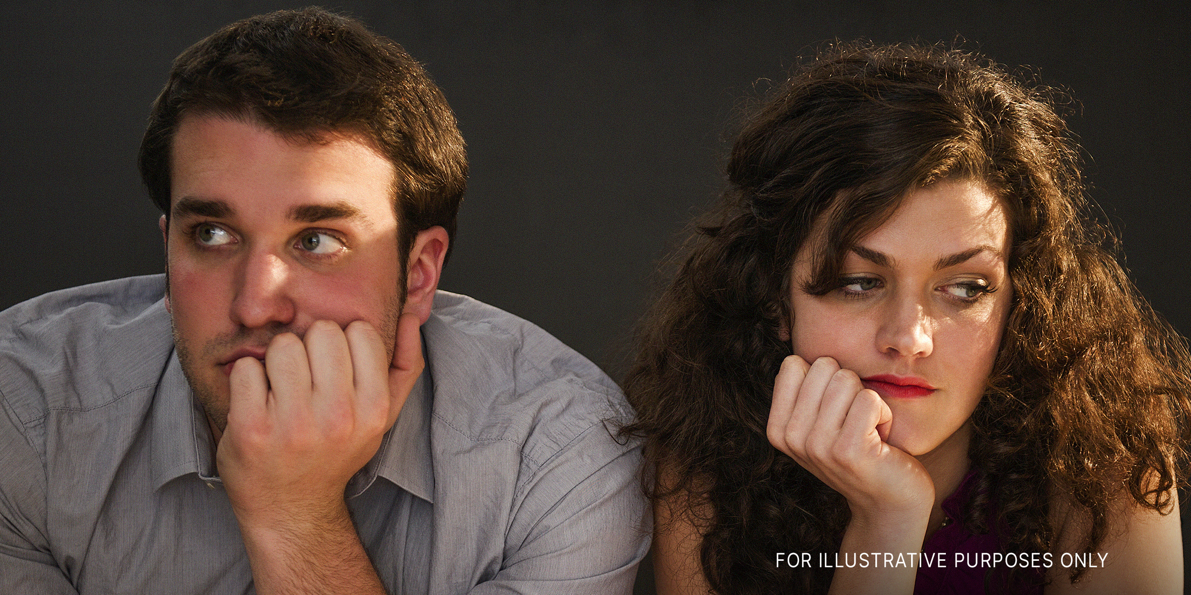Gelangweiltes Paar an einer Bar | Quelle: Getty Images