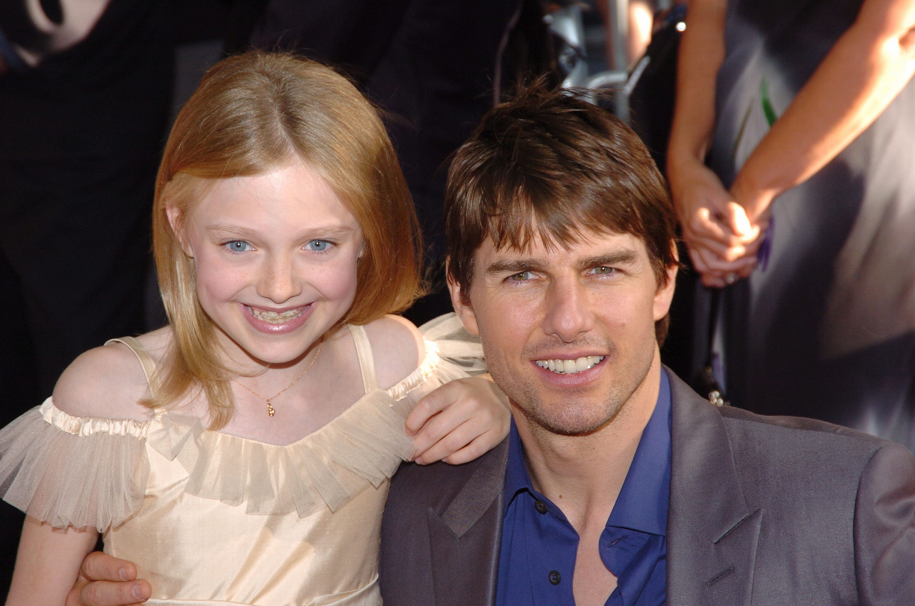 Tom Cruise und Dakota Fanning besuchen die "War Of The Worlds"-Premiere am 23. Juni 2005 in New York City | Quelle: Getty Images