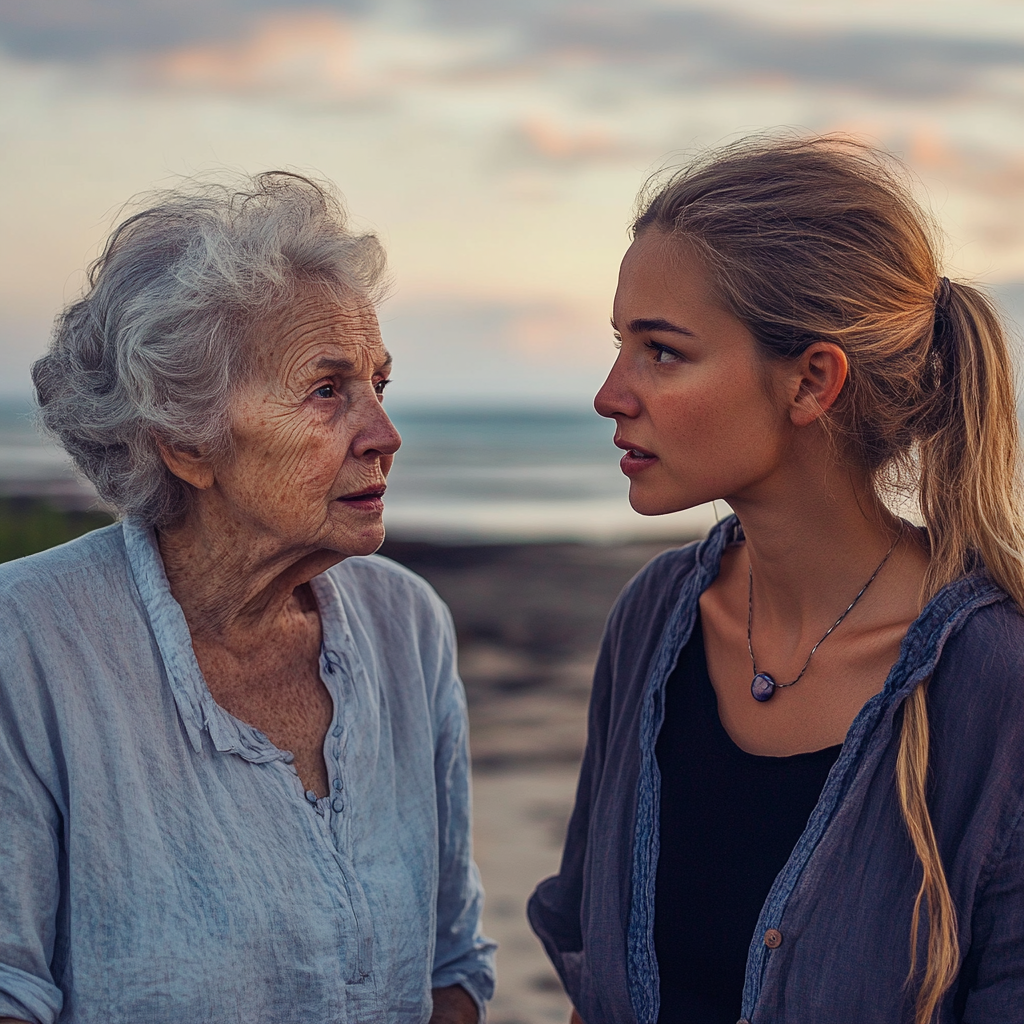 Zwei Frauen unterhalten sich an einem Strand | Quelle: Midjourney