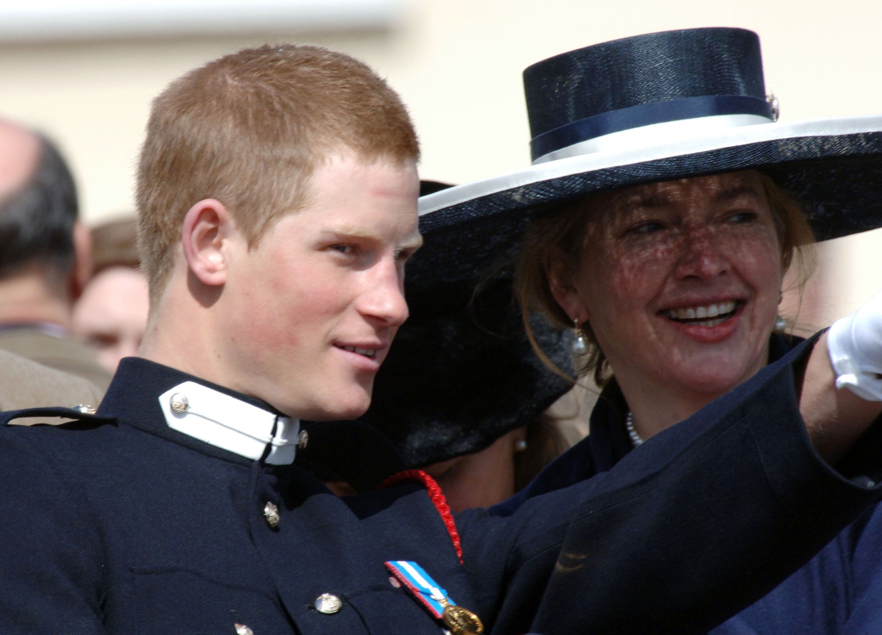 SANDHURST, ENGLAND - APRIL 12: Prince Harry talks to his former nanny Tiggy Legge-Bourke at his passing-out Sovereign's Parade at Sandhurst Military Academy on April 12, 2006 in Sandhurst, England. | Foto von: Anwar Hussein/Getty Images