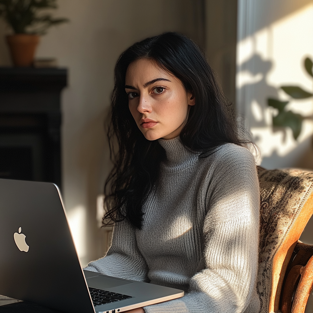 Erschöpfte Frau, die sich von ihrem Laptop abwendet | Quelle: Midjourney