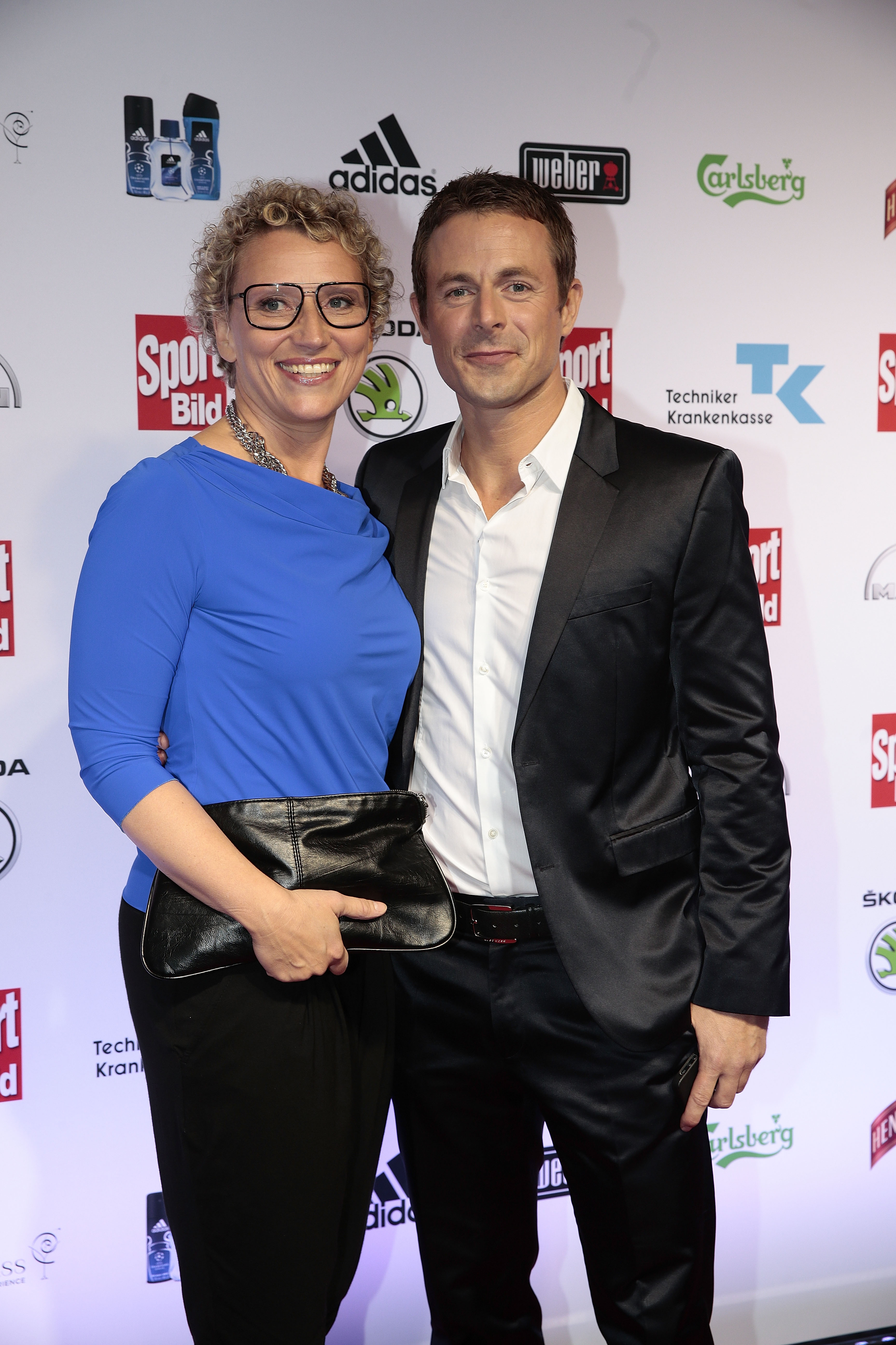 Alexander Bommes mit seiner Ex-Frau Julia Westlake posiert für die Medien vor den Sport Bild Awards in der Fischauktionshalle am 25. August 2014 in Hamburg | Quelle: Getty Images