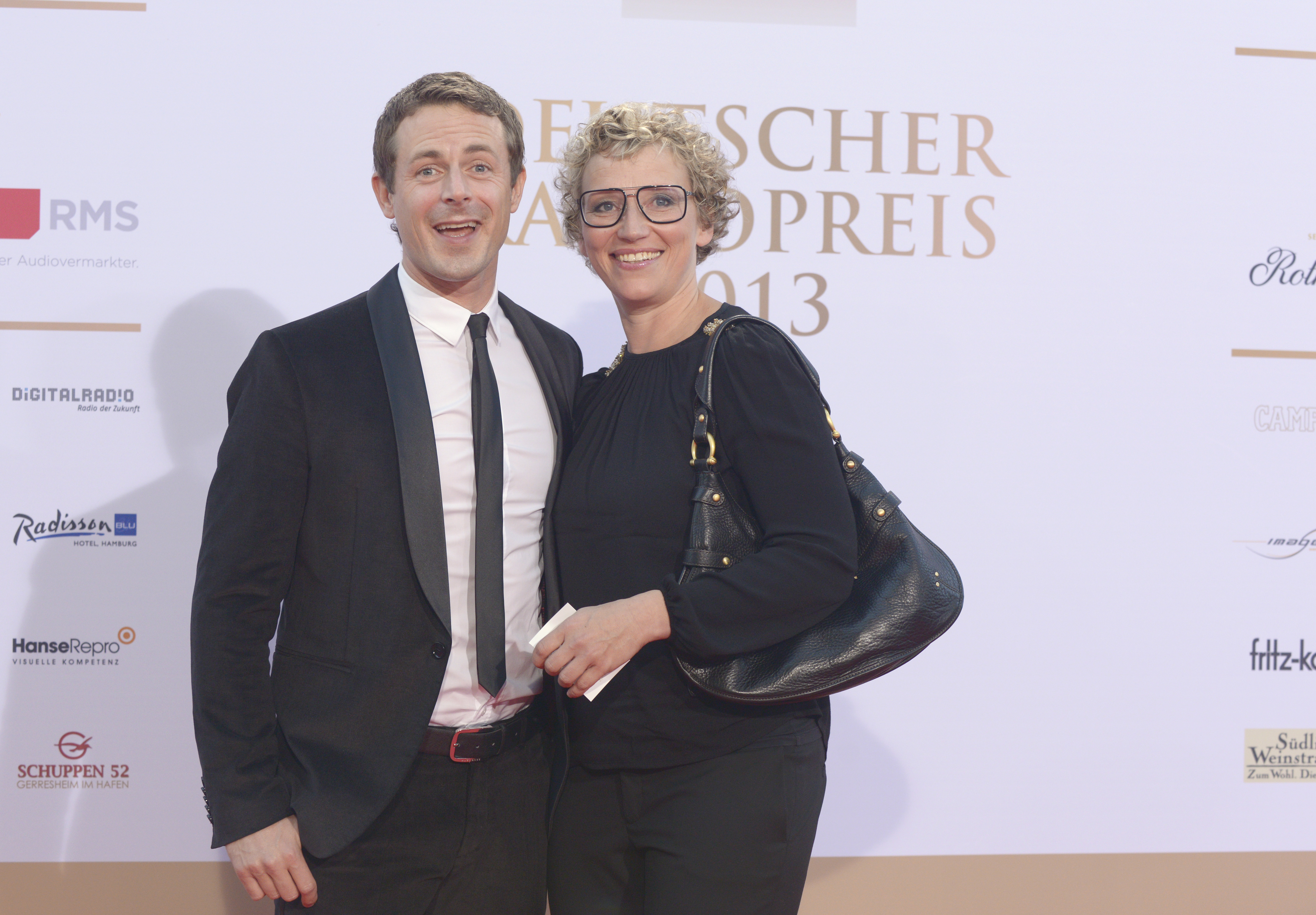 Alexander Bommes und Julia Westlake beim Deutschen Radiopreis 2012 | Quelle: Getty Images