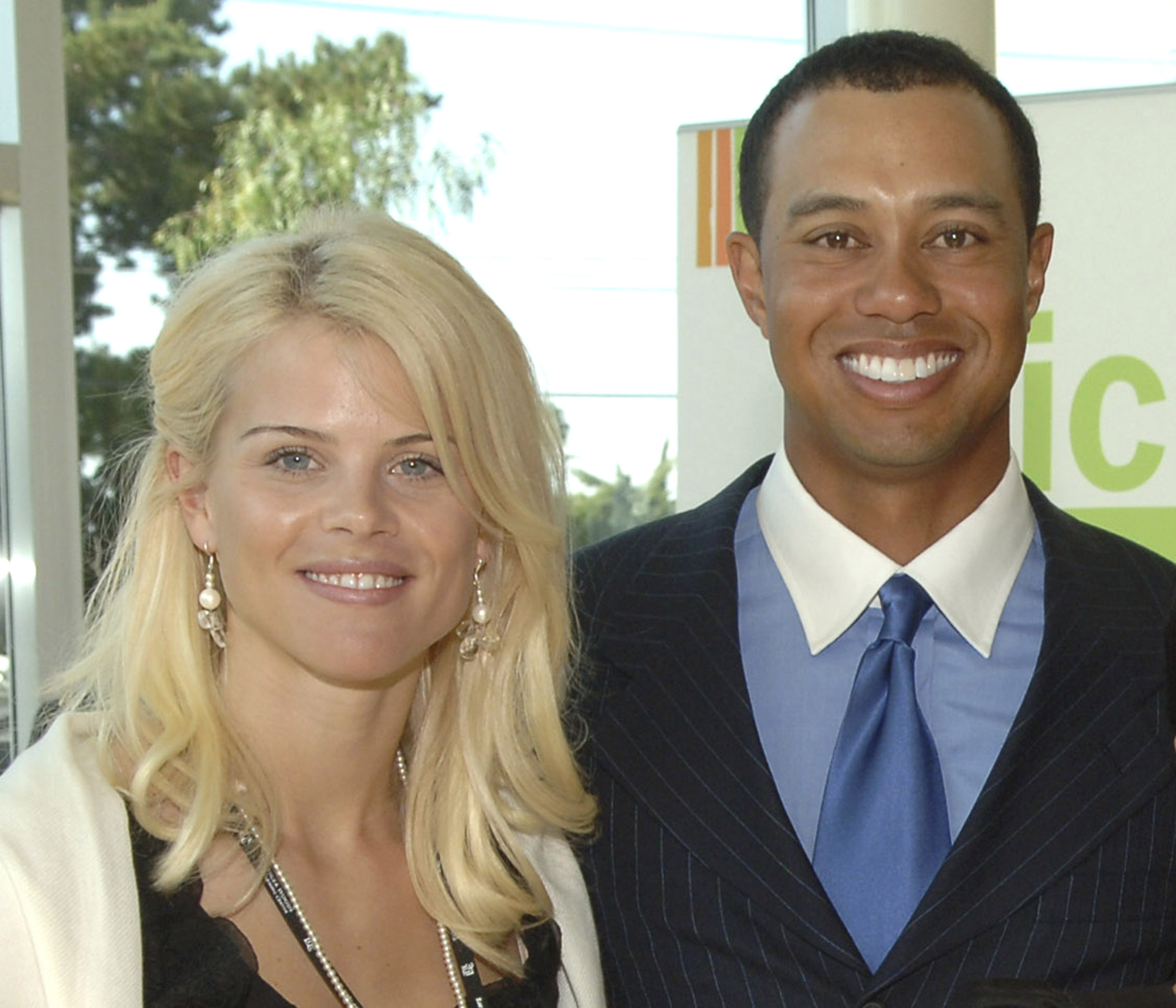 Elin Nordegren und Tiger Woods lächeln am 10. Februar 2006. | Quelle: Getty Images