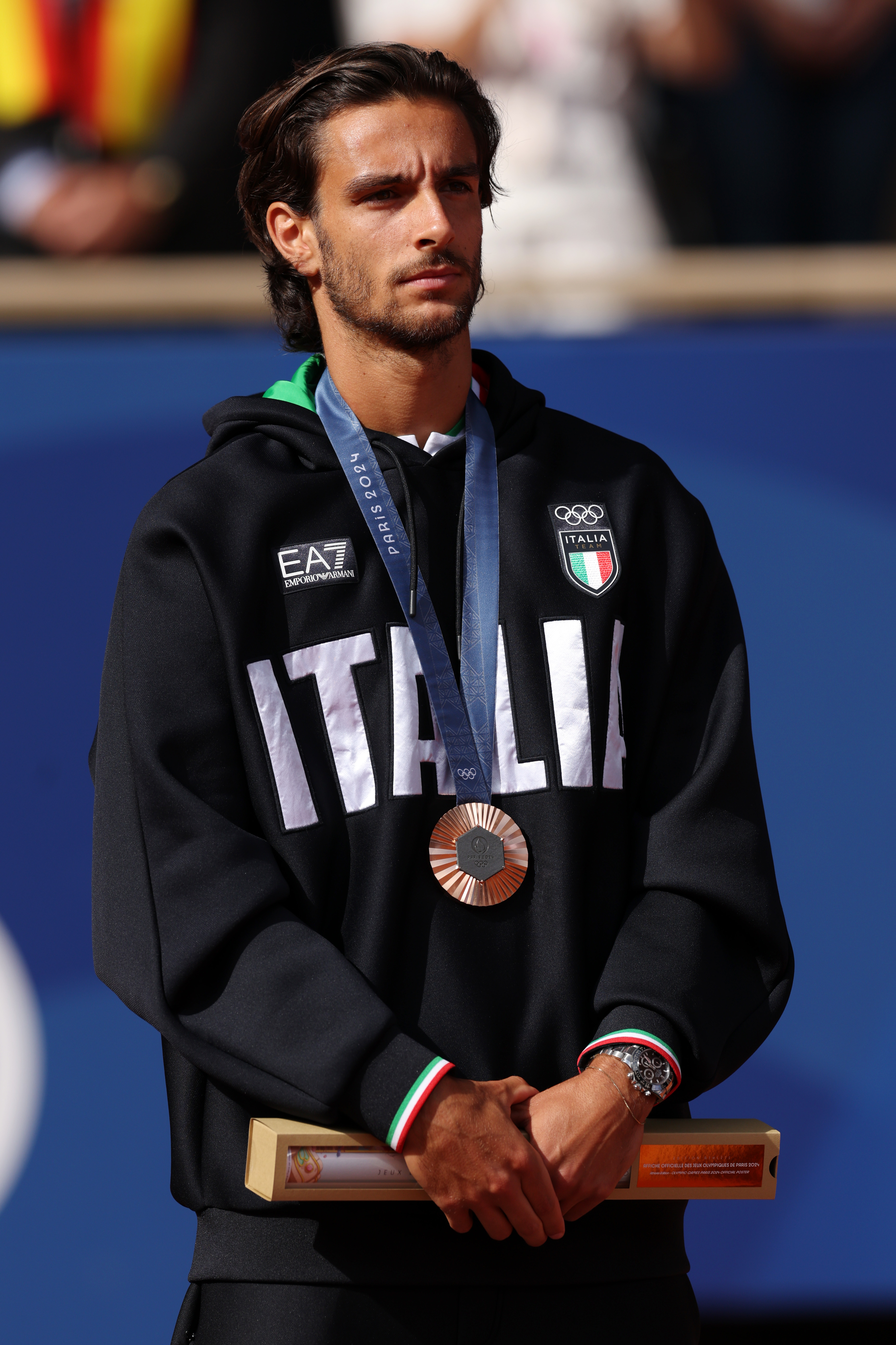 Der Italiener gewann bei den Olympischen Spielen 2024 in Paris Bronze bei den French Open. Die Medaille war einer der größten Erfolge seiner Karriere, bevor Mailand ihm einen ersten Vorgeschmack auf eine ganz andere Art von Laufsteg gab. | Quelle: Getty Images