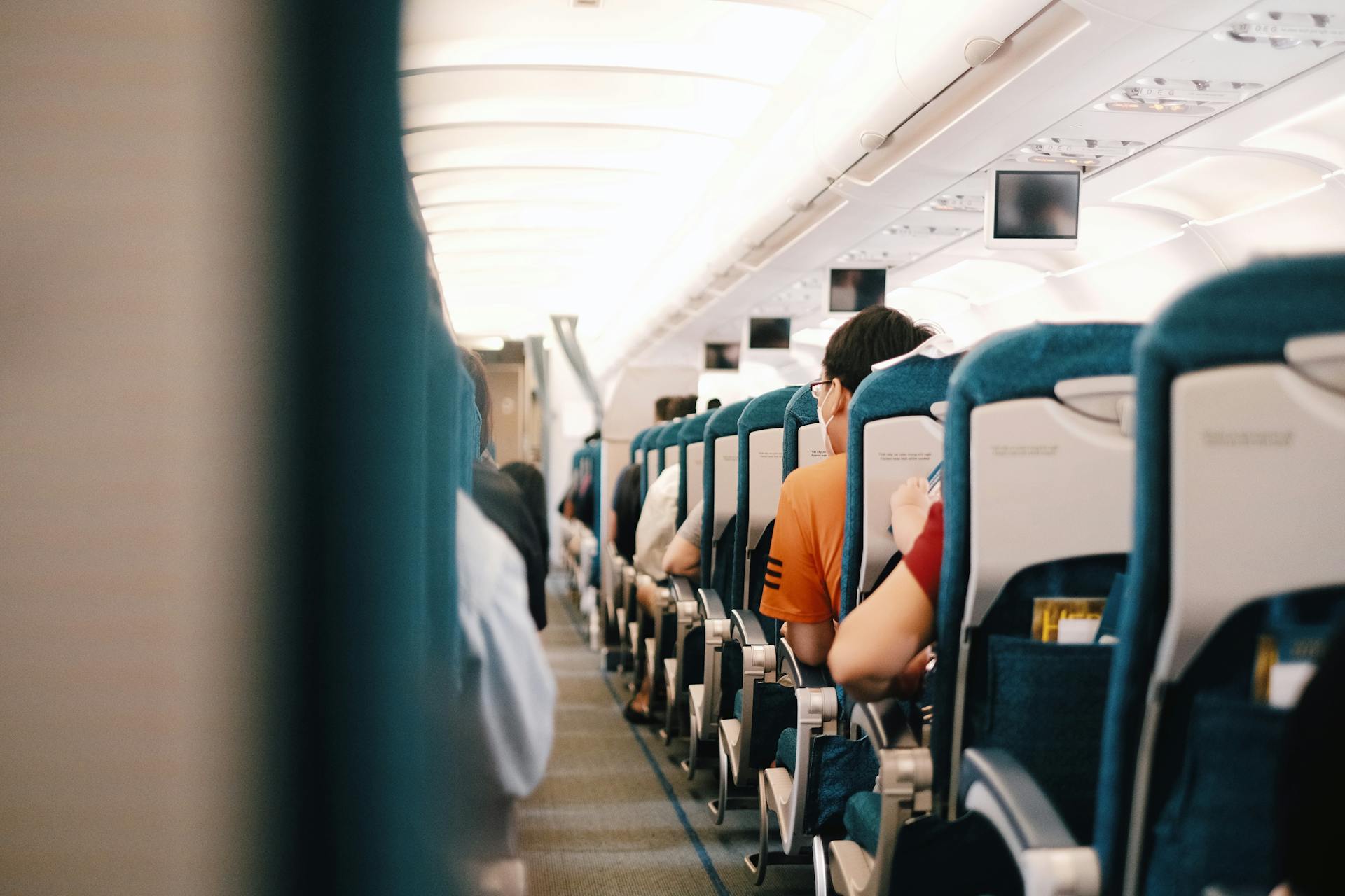 Passengers in an airplane | Source: Pexels