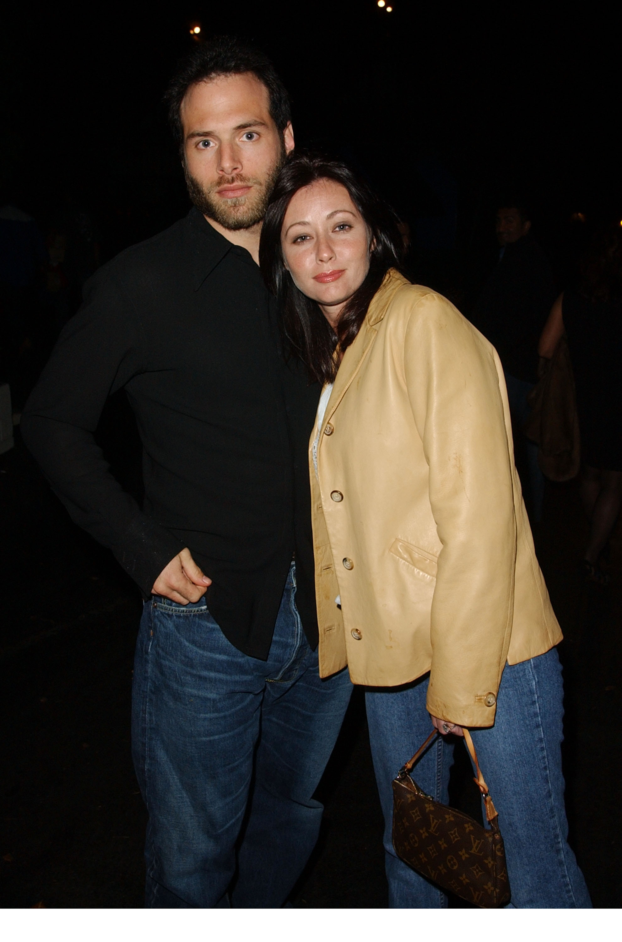 Rick Salomon und Shannen Doherty auf der Maxim Hot 100 Party im Jahr 2002. | Quelle: Getty Images