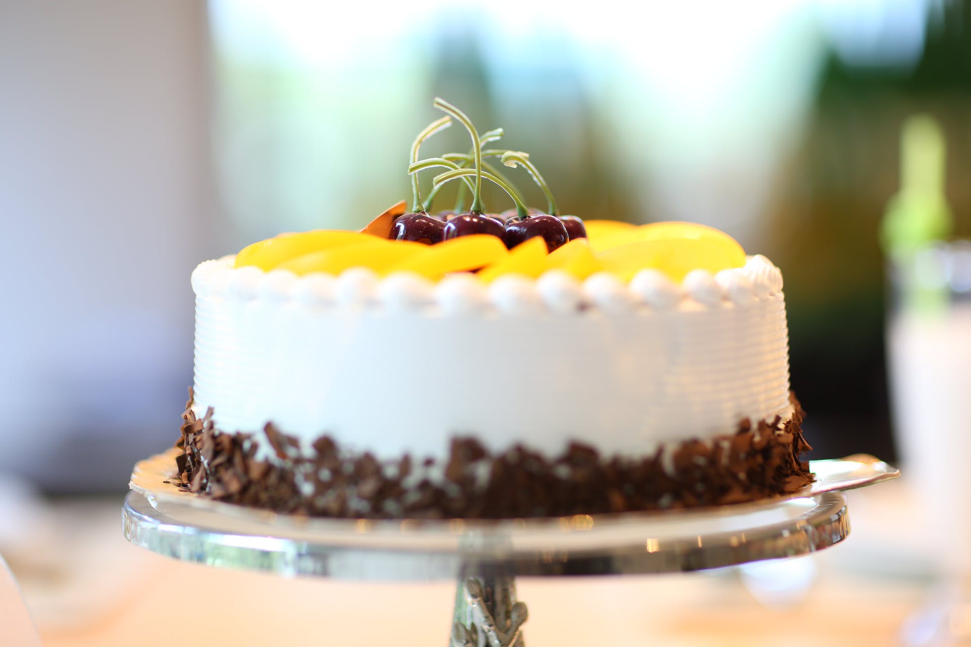 Kuchen mit Früchten gekrönt | Quelle: Pexels