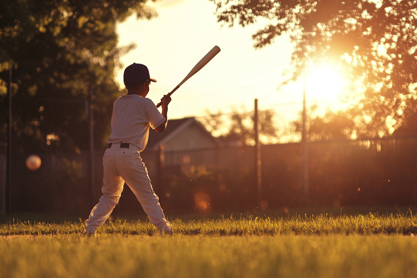 Ein Junge hält einen Baseballschläger | Quelle: Midjourney