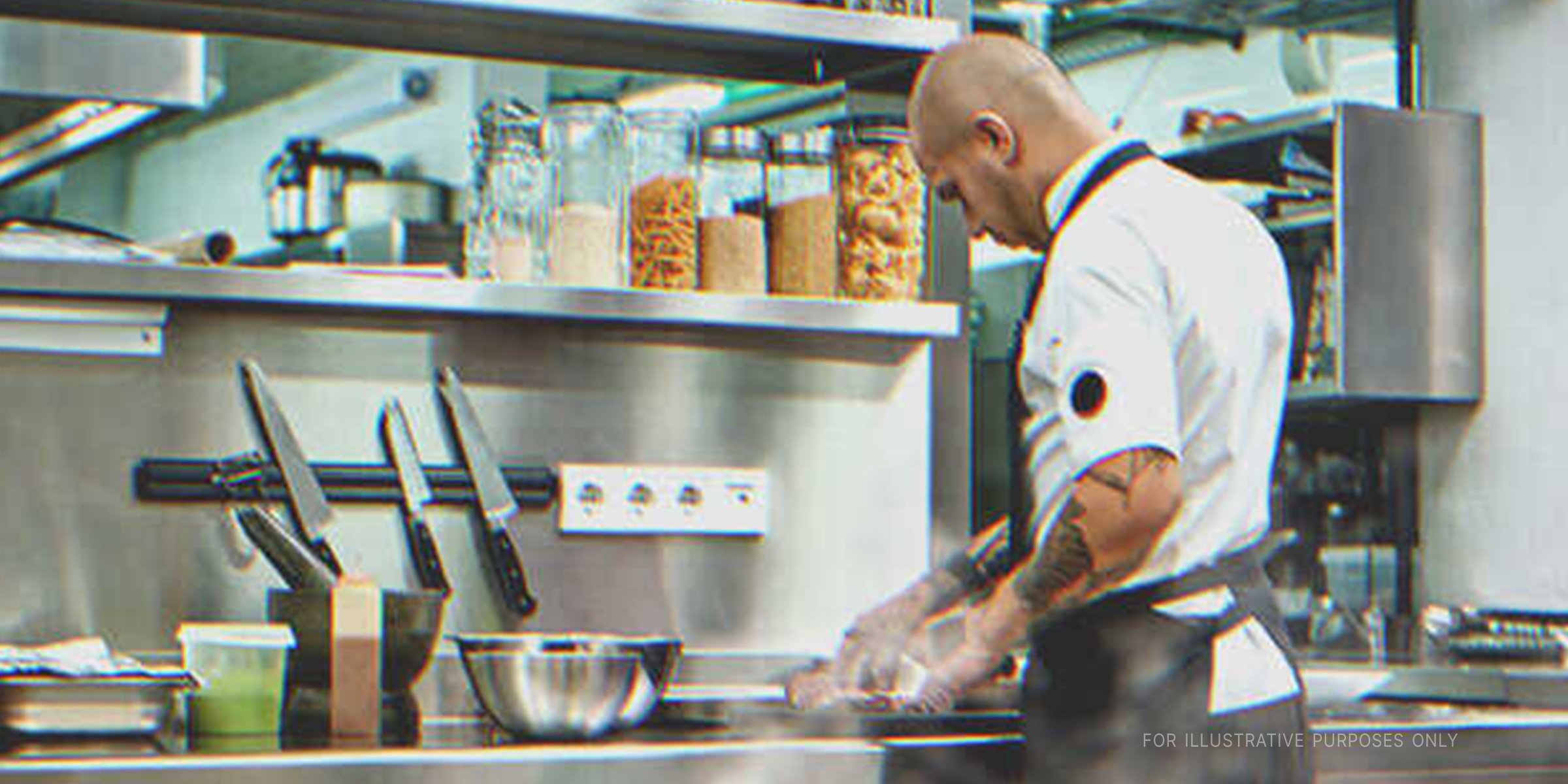 Ein Koch bei der Arbeit | Quelle: Shutterstock