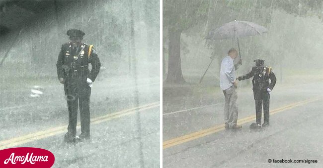 Ein Paar sieht eine Polizeibeamtin, die im Regen steht und Leben rettet