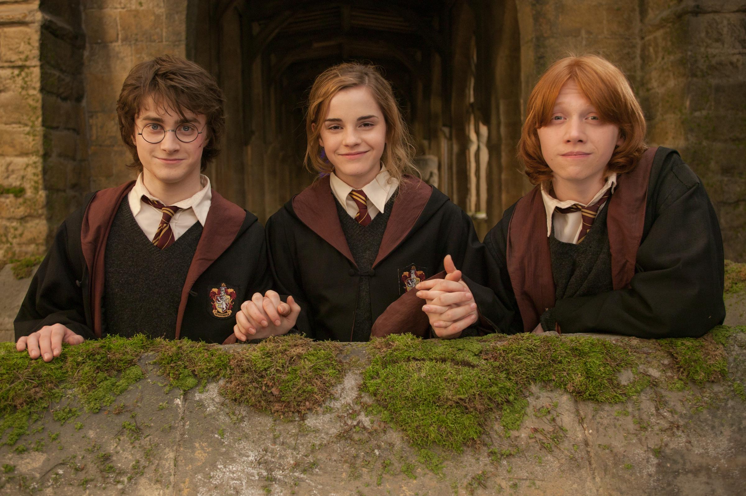 Daniel Radcliffe, Emma Watson und Rupert Grint am Set von