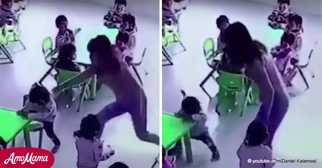 Auf dem Video ist zu sehen, wie eine gewalttätige Lehrerin den Stuhl unter dem kleinen Mädchen verschiebt