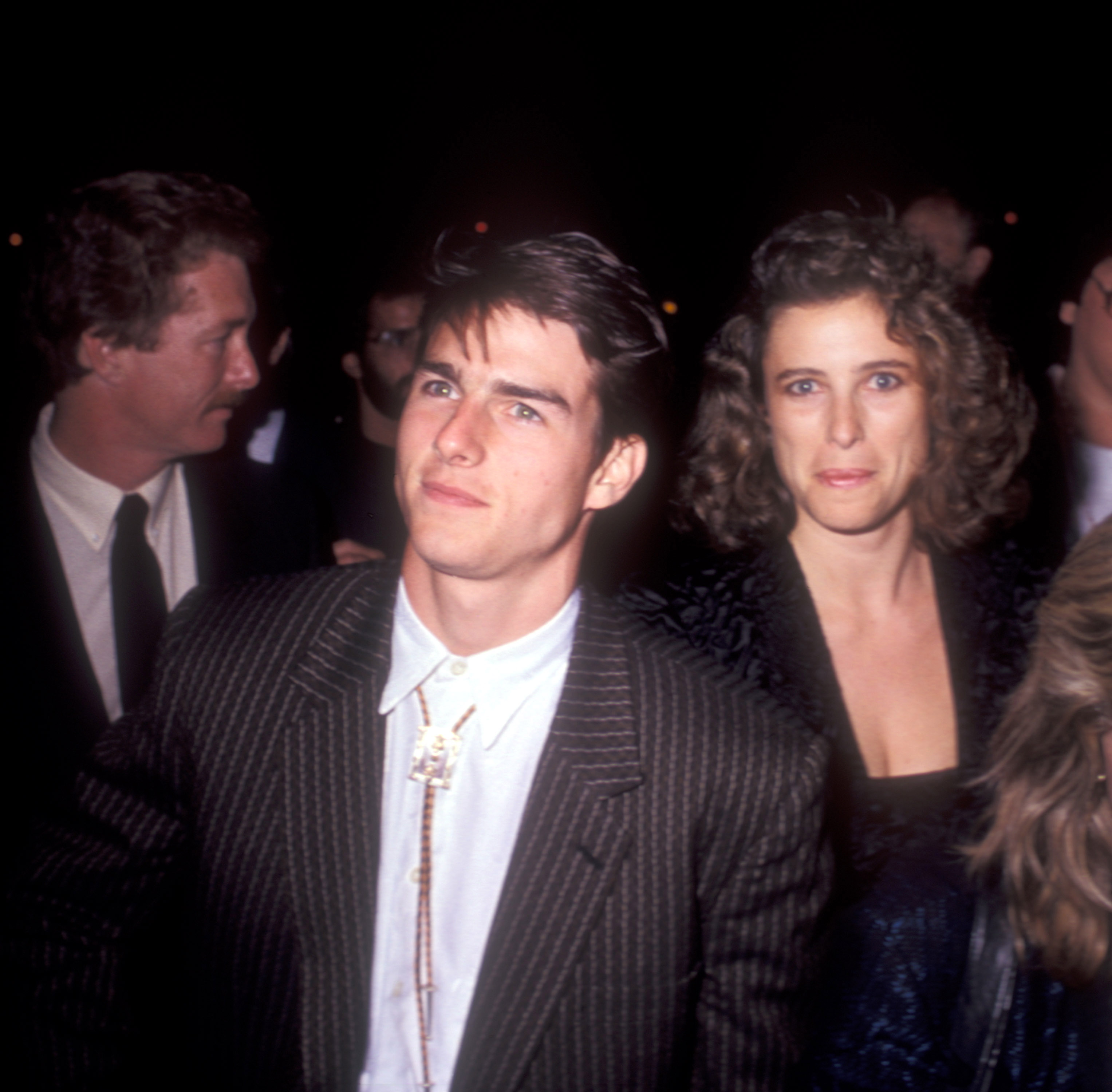 Tom Cruise und Mimi Rogers bei der Premiere von "The Color of Money" in Los Angeles, Kalifornien am 14. Oktober 1986. | Quelle: Getty Images