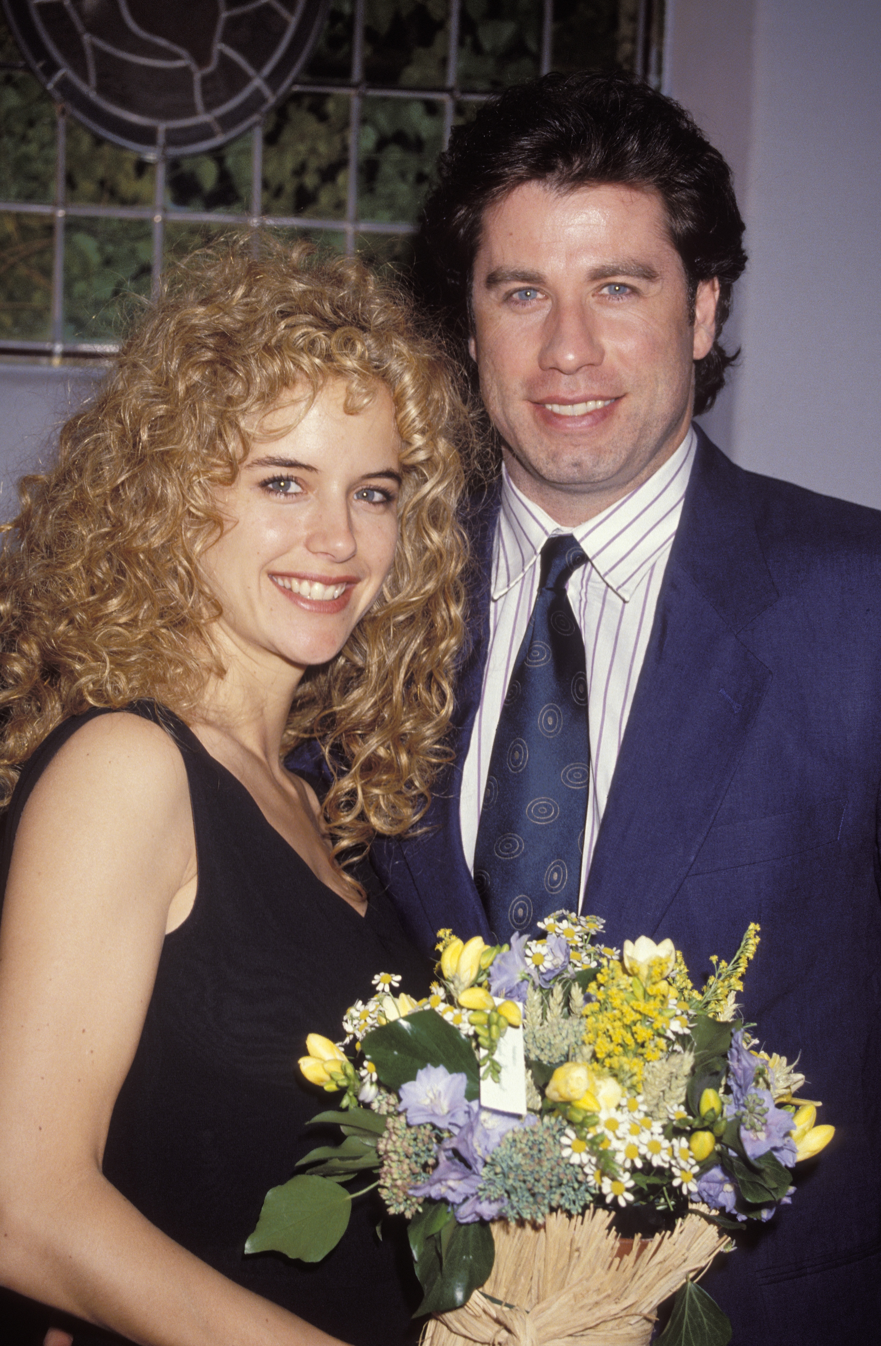 John Travolta und seine Frau besuchen das Deauville Film Festival am 9. Januar 1991 | Quelle: Getty Images