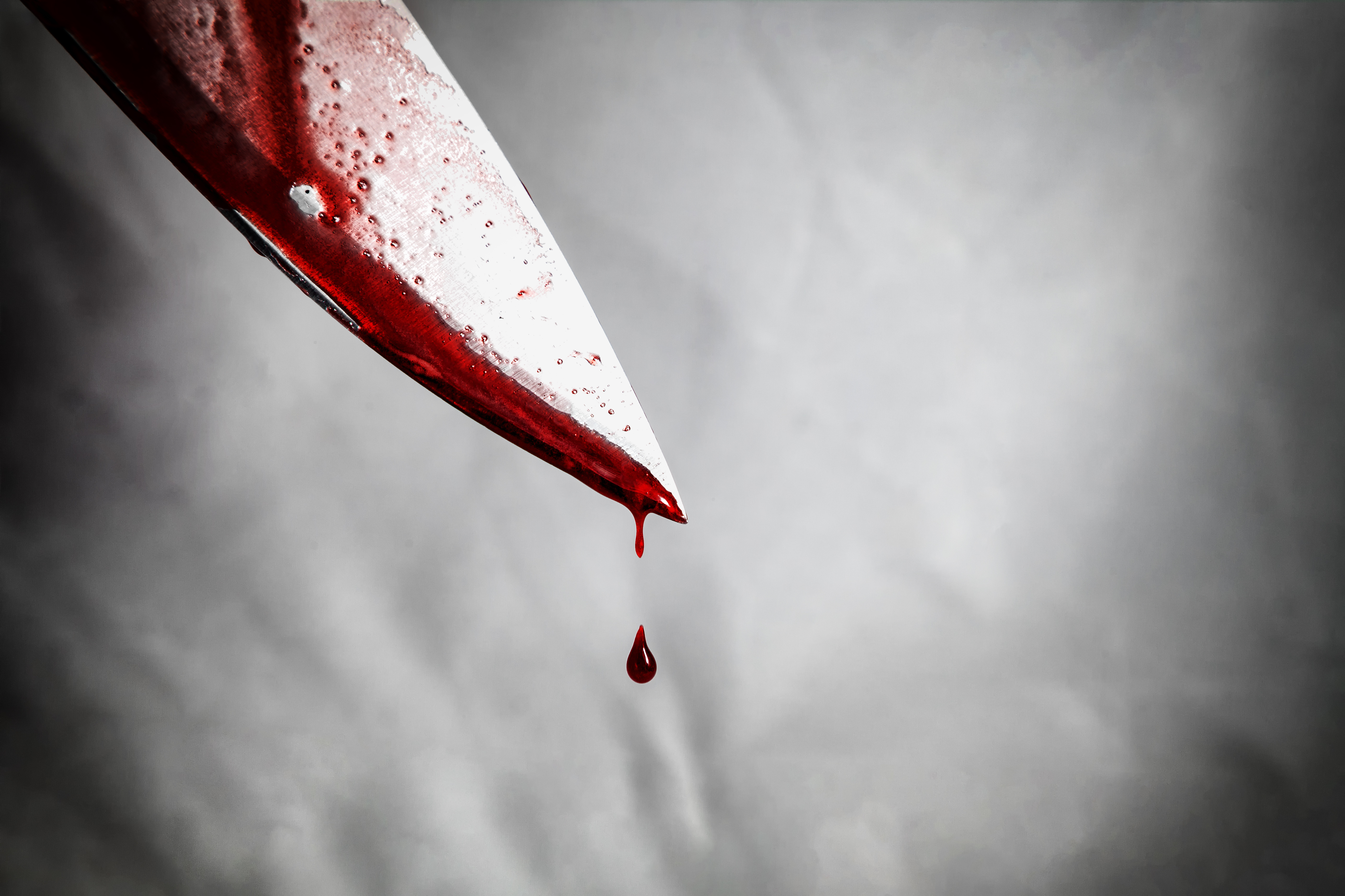 Nahaufnahme eines Mannes mit Messer | Quelle: Shutterstock