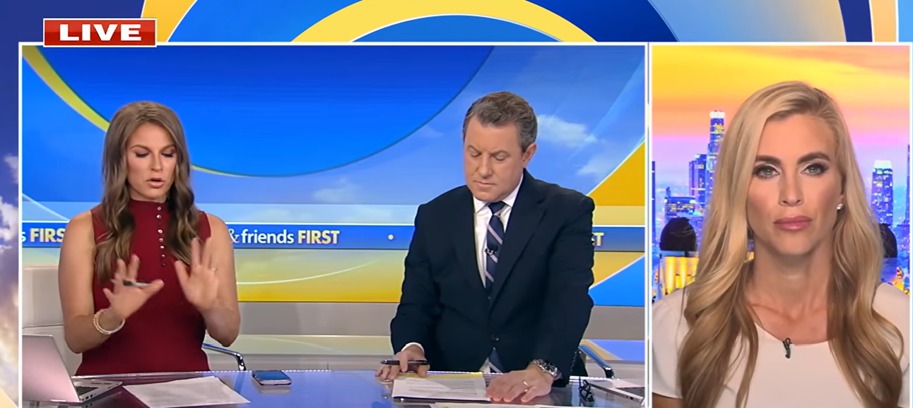 Katie Zacharia tritt am 31. August 2026 in einem Live-Fernsehinterview auf, trägt ein weißes Oberteil und unterhält sich per Videokonferenz mit zwei Moderatoren im Studio. | Quelle: YouTube/Fox News Clips