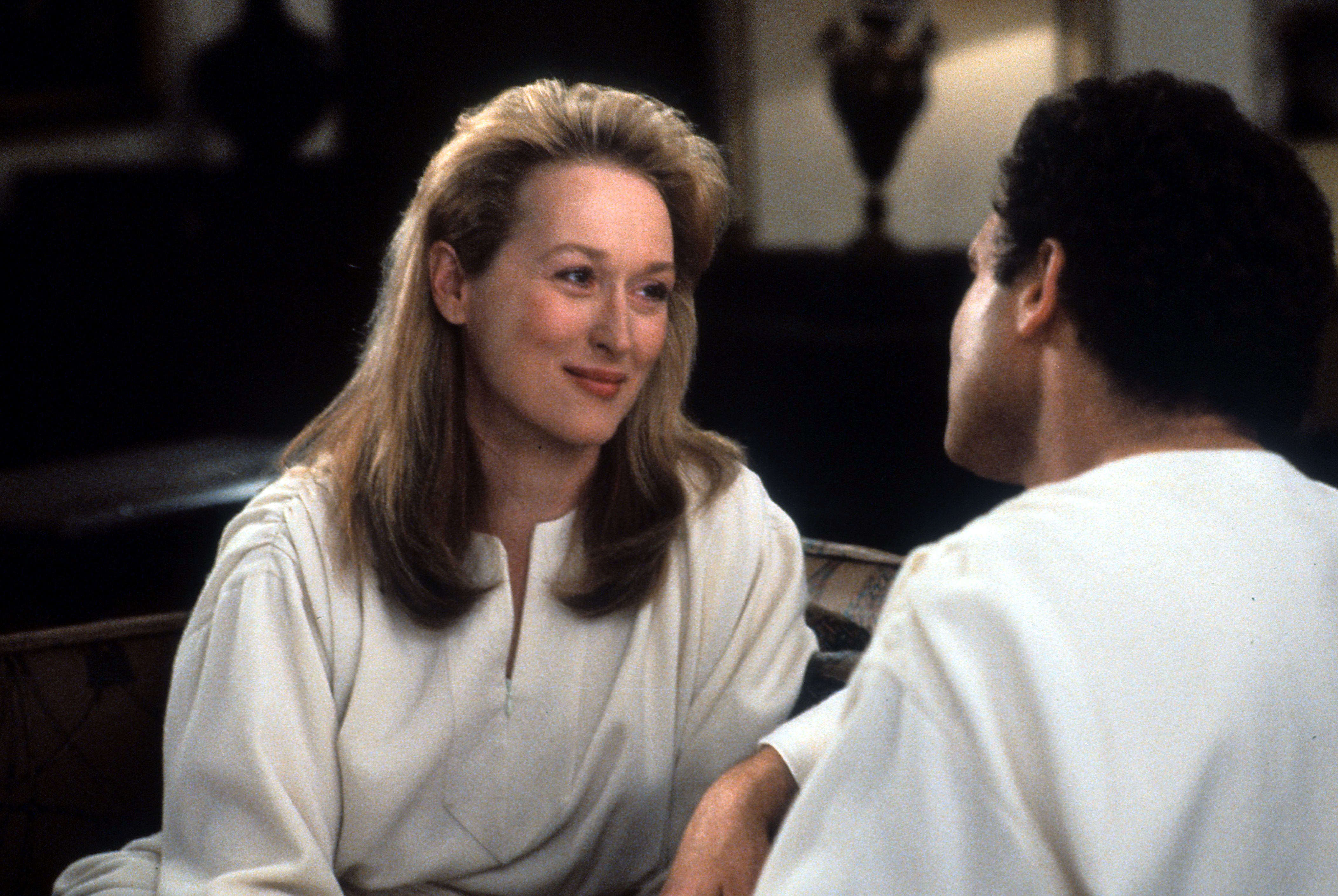 Meryl Streep und Albert Brooks bei den Dreharbeiten zu "Verteidige dein Leben", ca. 1991. | Quelle: Getty Images