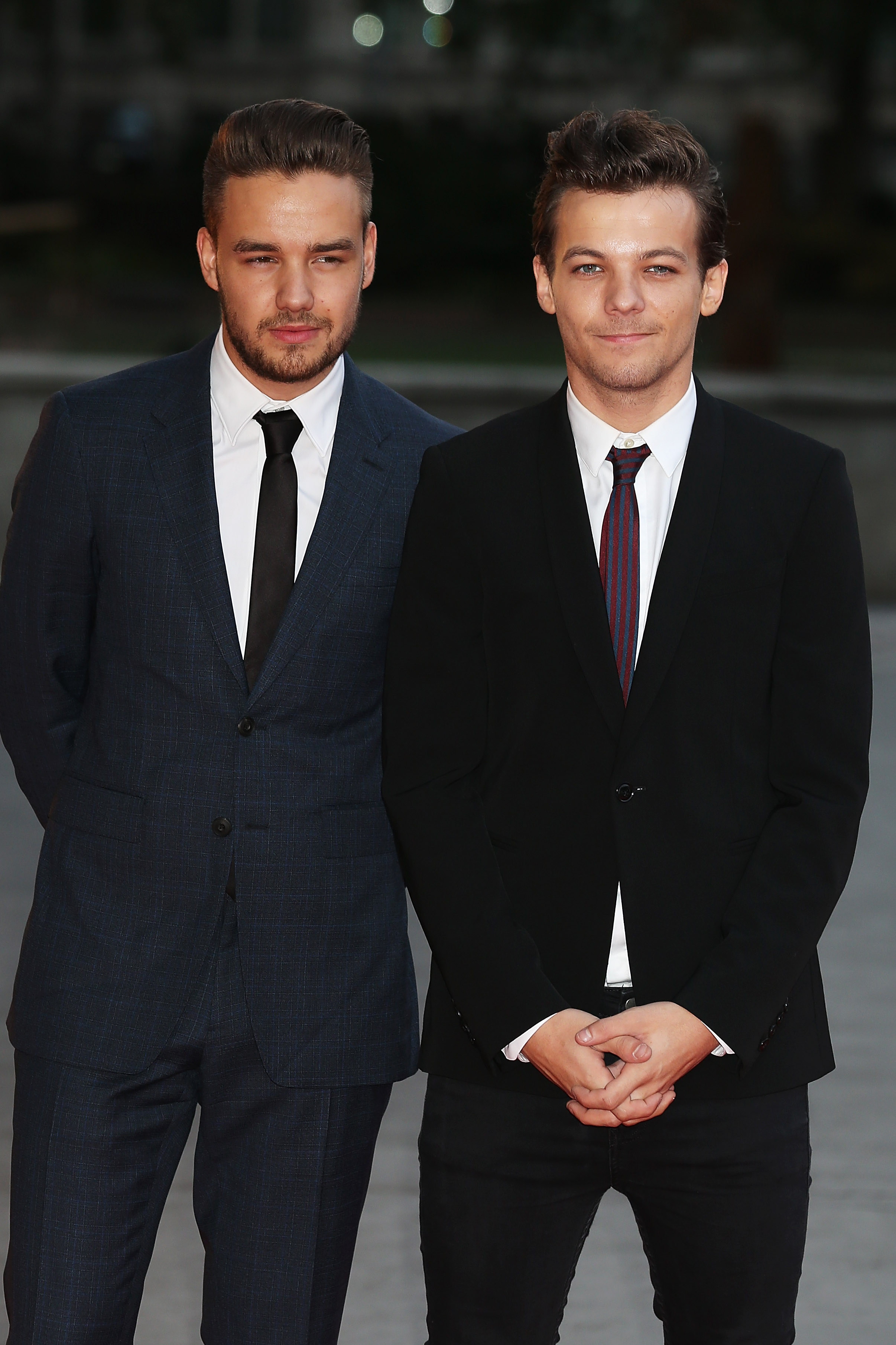 Louis Tomlinson und Liam Payne besuchen den Believe in Magic Cinderella Ball in London am 10. August 2015 | Quelle: Getty Images