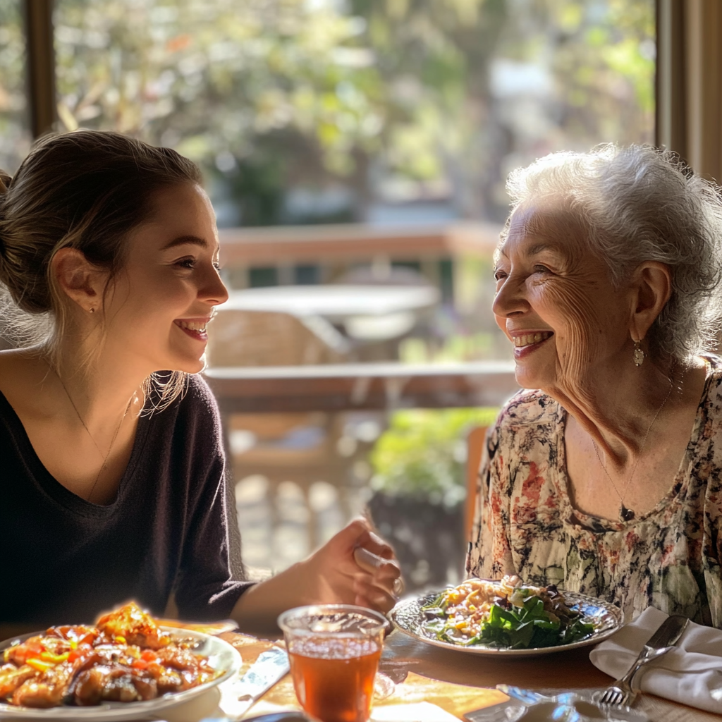 Junge Frau und ältere Frau beim Mittagessen | Quelle: Midjourney