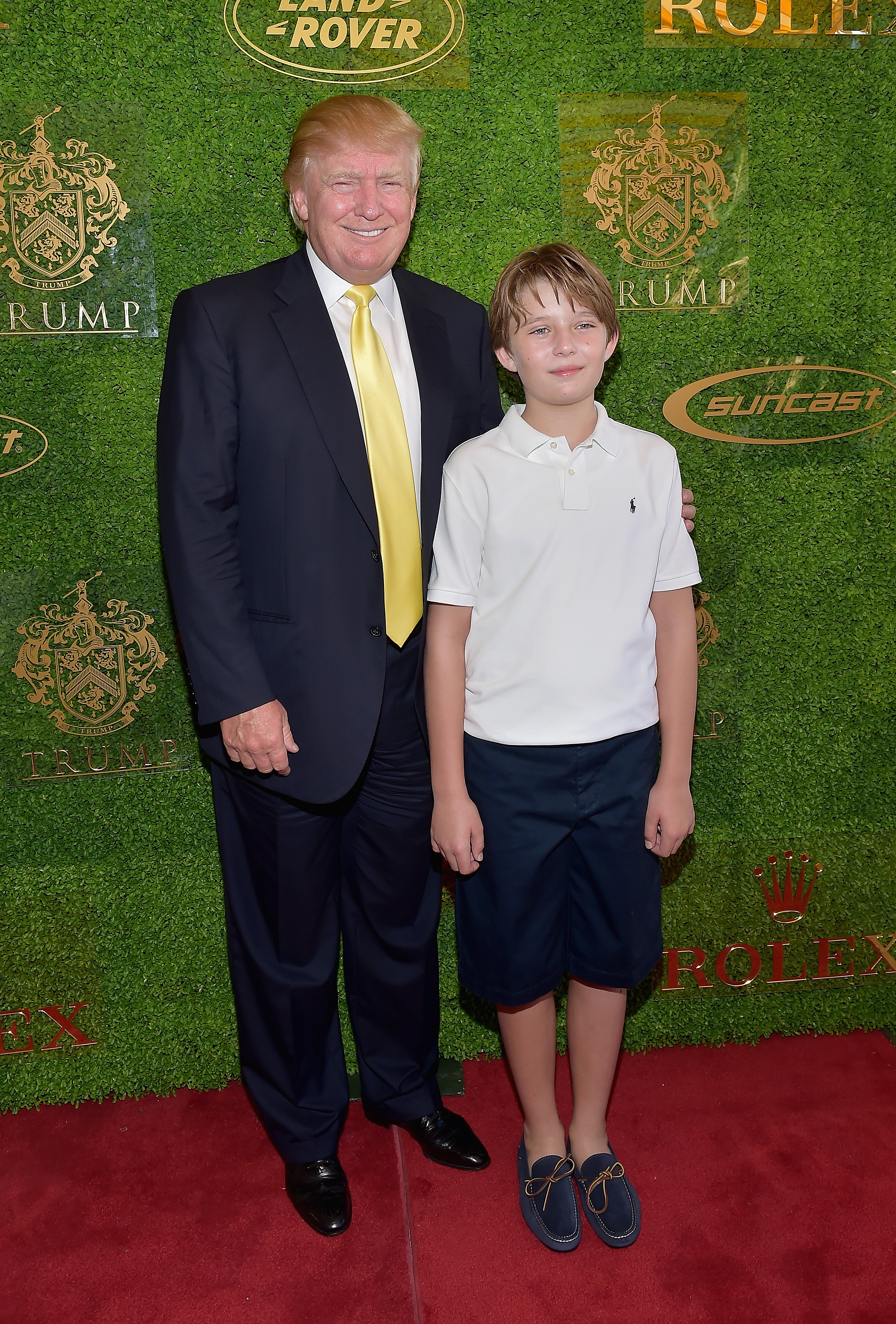 Donald und Barron Trump beim Trump Invitational Grand Prix im Mar-a-Lago Club am 4. Januar 2015 in Palm Beach, Florida. | Quelle: Getty Images