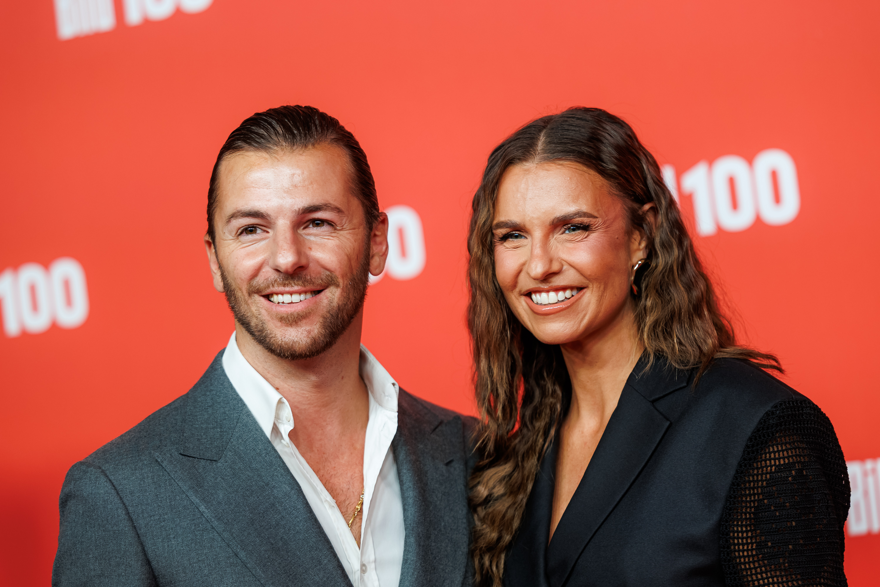 Riccardo Basile und Laura Wontorra nehmen am 8. September 2026 in Berlin am BILD100 im Axel-Springer-Neubau teil | Quelle: Getty Images