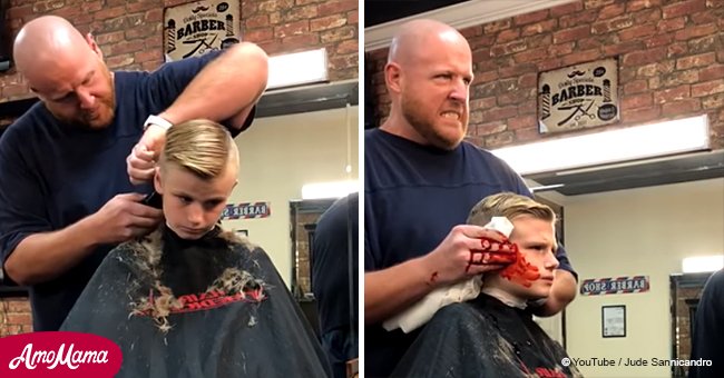 Ein 10-Jähriger schreit entsetzt, nachdem der Friseur so tut, als ob er ihm das Ohr abgeschnitten hätte