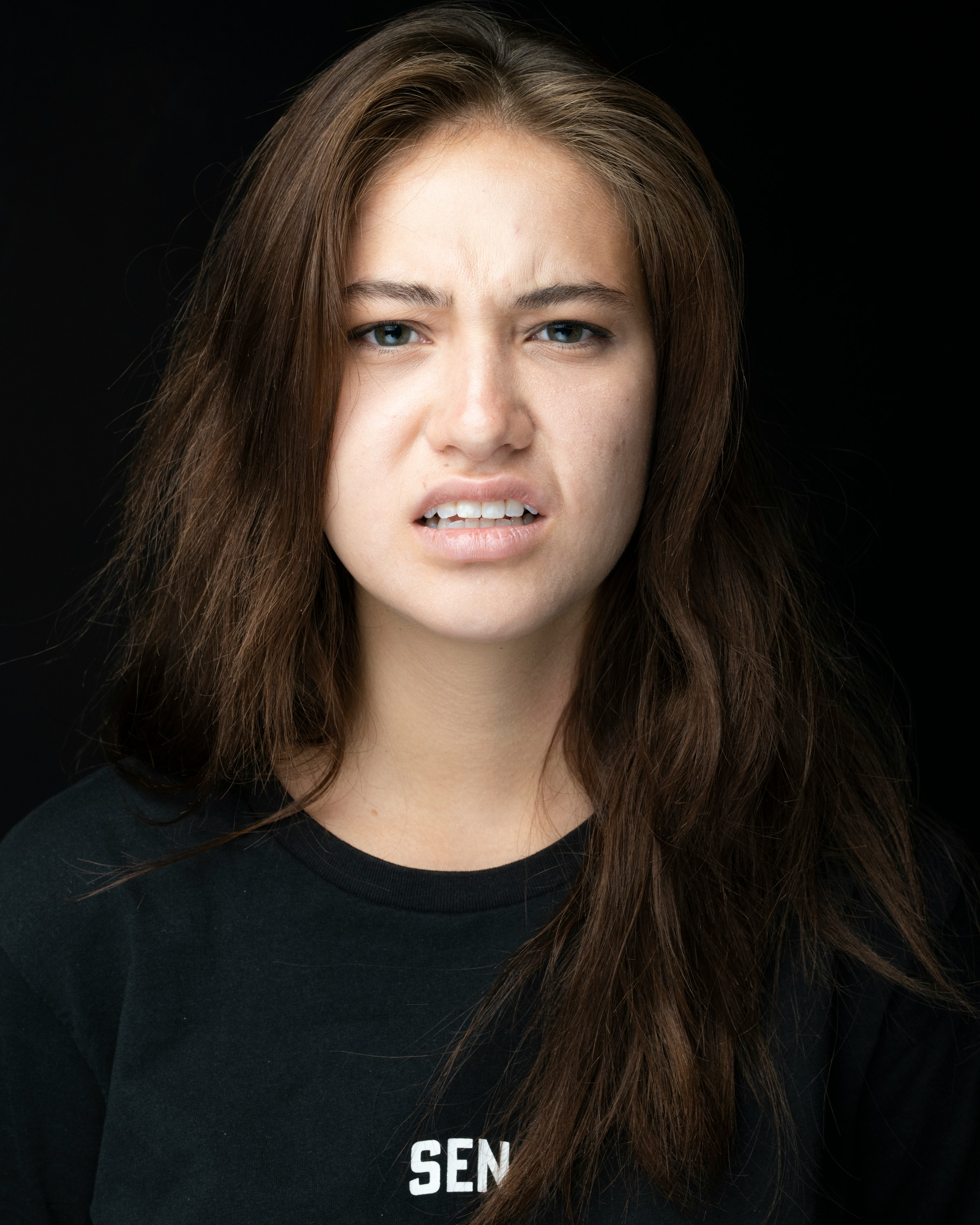 Eine Frau macht ein Gesicht | Quelle: Unsplash