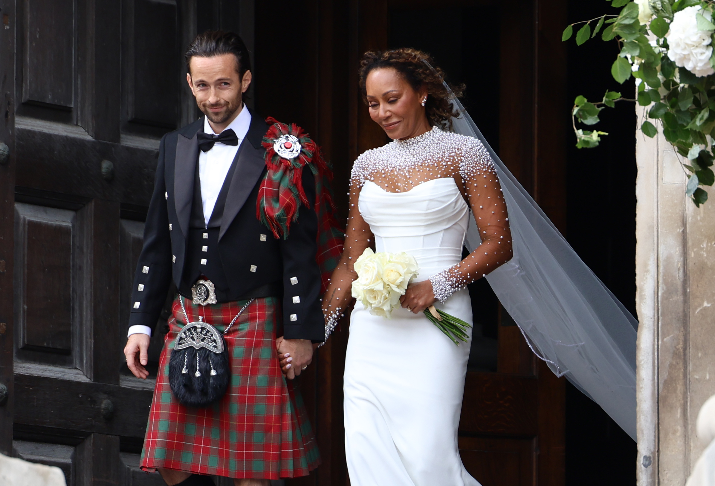 Spice Girl Melanie Brown, Mel B, und ihr Ehemann, der Friseur Rory McPhee, verlassen die St. Paul's Cathedral in London am 5. Juli 2025 | Quelle: Getty Images