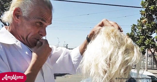 Mann schneidet die Haare einer obdachlosen Frau. Aber schauen Sie sich ihr Gesicht wenige Minuten später an