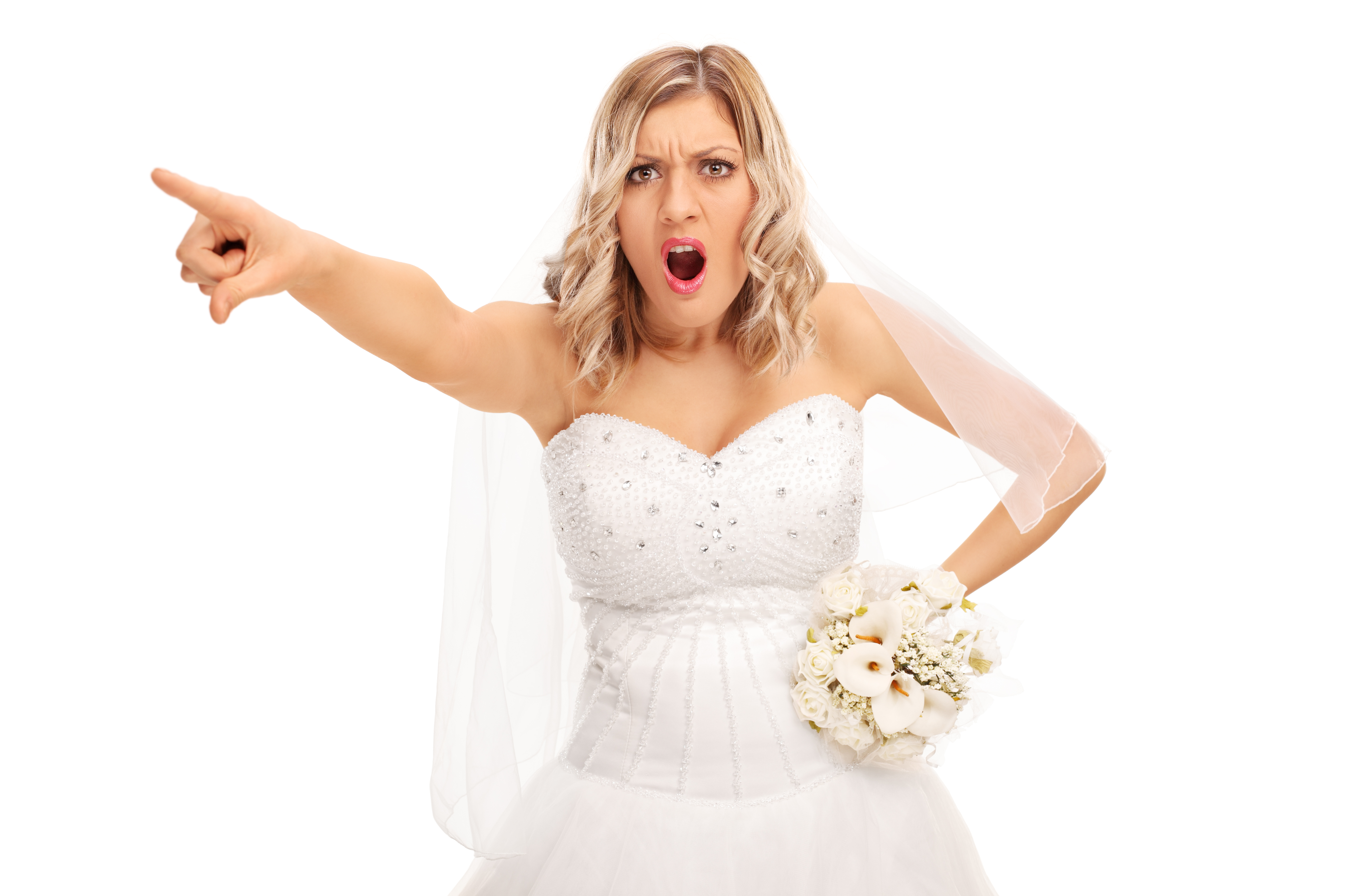 Eine wütende Braut, die auf etwas zeigt und schreit | Quelle: Shutterstock