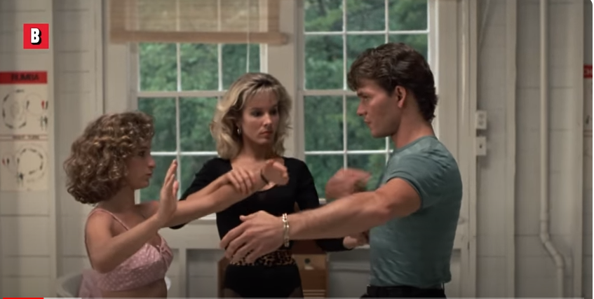 Der ehemalige Star und andere Darsteller in einer Szene in "Dirty Dancing" | Quelle: YouTube/@BoxofficeMoviesScenes