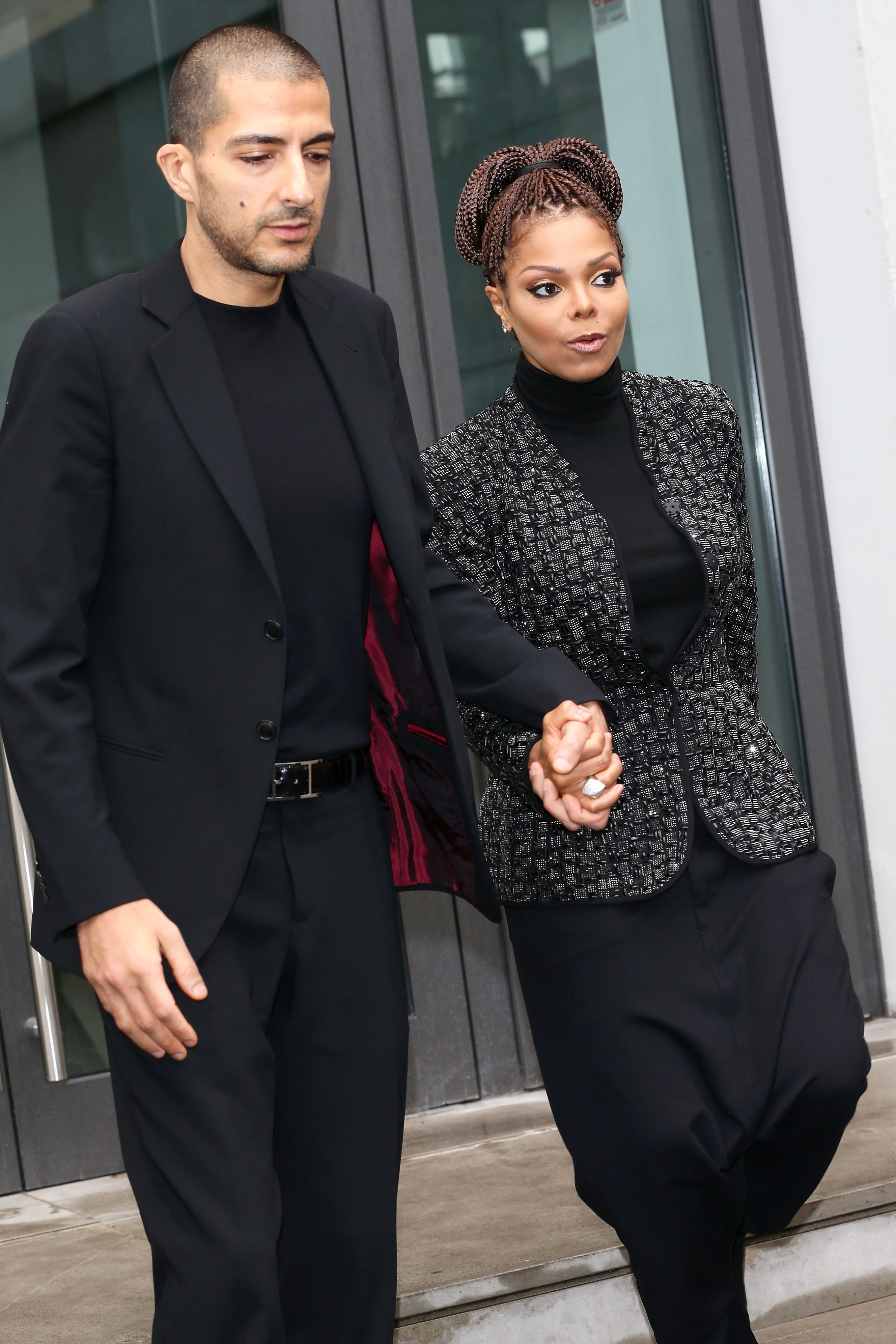 Wissam al Mana und Janet Jackson bei der Giorgio Armani Modenschau im Rahmen der Milan Fashion Week Womenswear Herbst/Winter 2013/14 am 25. Februar 2014 in Mailand, Italien | Quelle: Getty Images